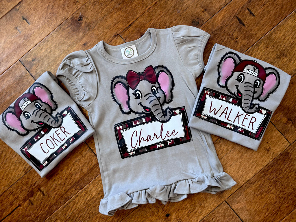 AL doodle mascot + name plate