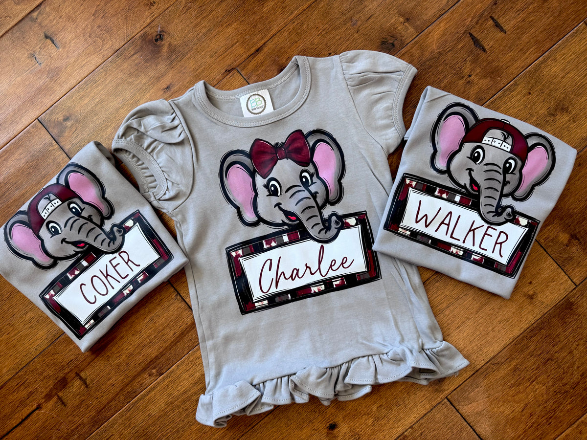 AL doodle mascot + name plate