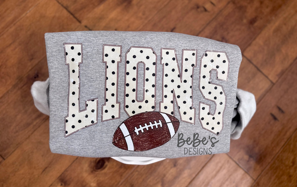 Polka mascot + football